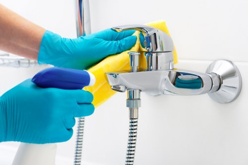Bathroom and kitchen cleaning as part of a Stockwell Airbnb clean